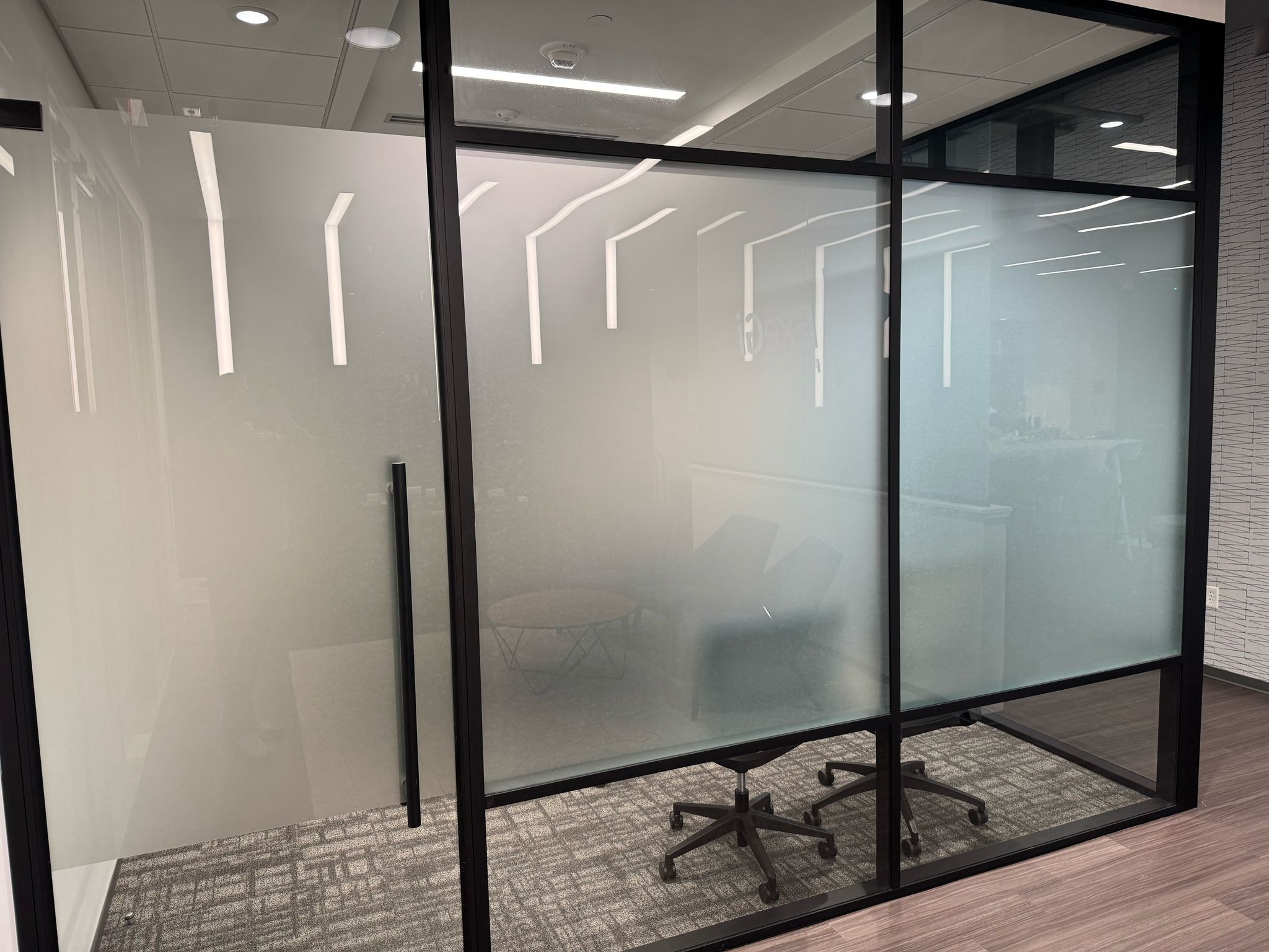 Office space in Rockville, MD featuring decorative window film as part of commercial window tinting by Capital Wrappers, enhancing privacy and aesthetics